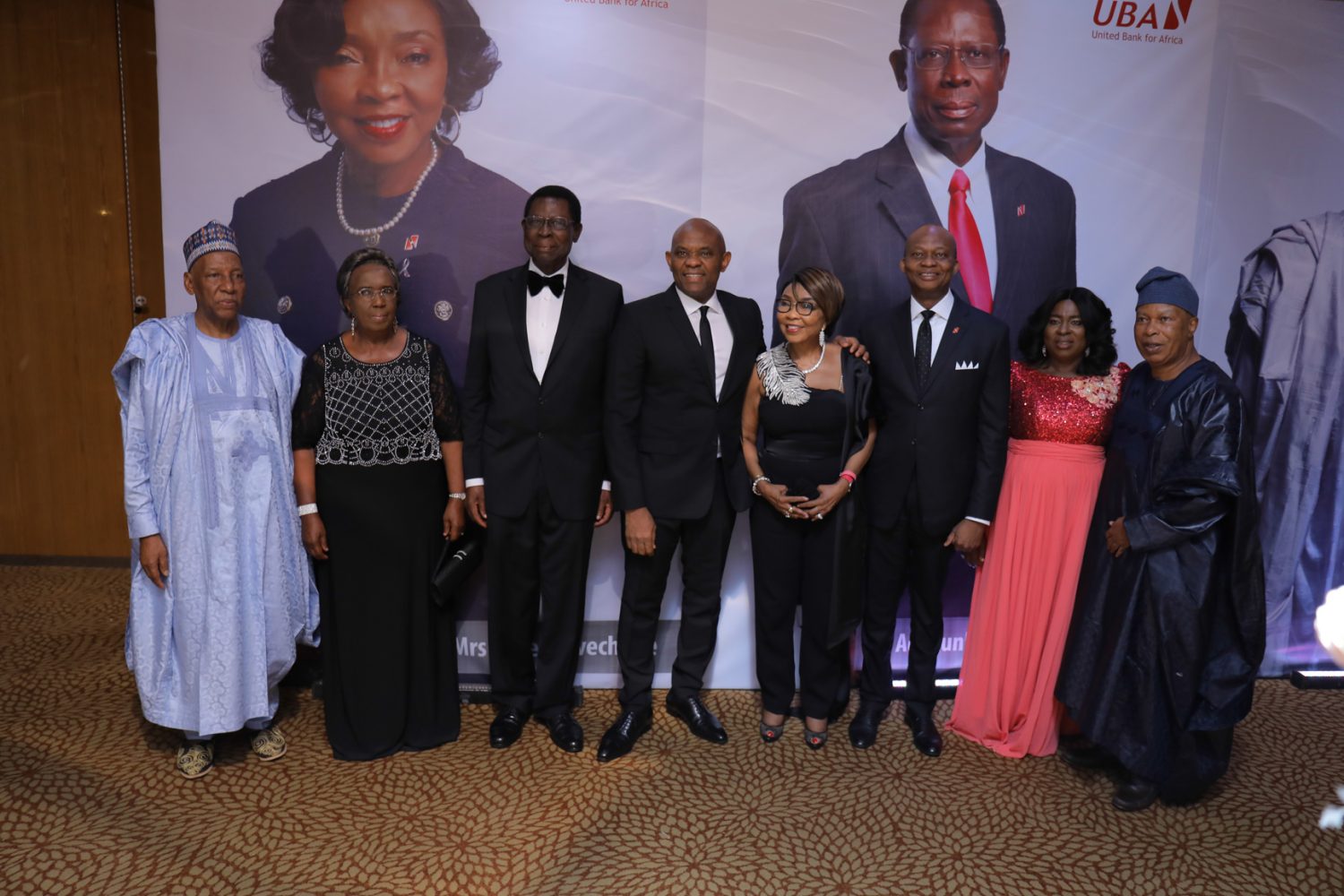Appreciating Meritorious Services: L-R: Former Non-Executive Director, Alhaji Jafaru Paki; Emeritus Professor Mercy Olumide; Former Non-Executive Director, Ambassador Adekunle Olumide; Chairman, UBA Plc, Mr. Tony Elumelu; Former Non-Executive Director, Mrs. Rose Okwechime; GMD-CEO, Kennedy Uzoka; Former Non-Executive Director, Mr Zekeri Yahaya and wife Clara, during the send forth cocktail and dinner held by the Bank for the former Non-Executive Directors, held at Transcorp Hilton, Abuja on Friday