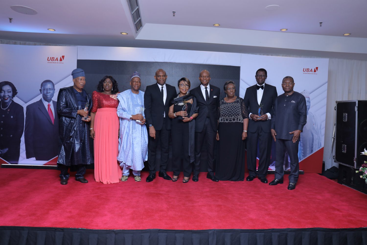 Choice 4: Appreciating Meritorious Services: l-r: Former Non-Executive Director, United Bank for Africa (UBA) Group, Mr. Yahaya Zekeri and wife, Clara; Former Non-Executive Director, Alhaji Jaafaru Paki; Group Chairman, Mr. Tony Elumelu; Former Non-Executive Director, Mrs. Rose Okwechime; GMD-CEO, Mr. Kennedy Uzoka; Former Non-Executive Director, Ambassador Adekunle Olumide and wife, Emeritus Professor Mercy Olumide; and Deputy Managing Director(DMD), Mr. Victor Osadolor during the send forth cocktail and dinner held by the Bank for the former Non-Executive Directors, held at Transcorp Hilton, Abuja on Friday