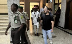 Binance executive releases video from detention, calls for U.S. government assistance amid probe