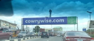 Cowrywise splurges millions on billboard ads to win market share 