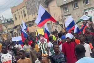 Protest: Display of Russia flag by Nigerians sparks controversy as FG labels action “treasonable”  